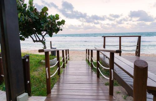 Porto de Galinhas Apartamento | Flat térreo 2 quartos-Resort Marulhos B101-Muro Alto-Porto de Galinhas
