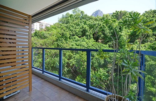 Zona Sul Apartamento | Piso con piscina, vista al Corcovado, plaza de aparcamiento y servicios.