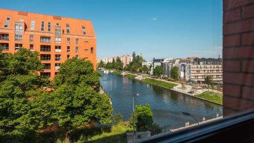 Old Town Apartamento | Flatbook - Riverside Loft Gdańsk Apartments with Parking