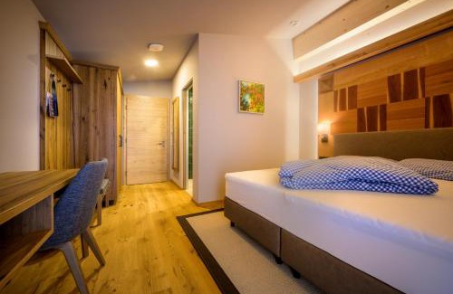 Ellmau Cama Y Desayuno | Flora - Das kleine Gartenhotel