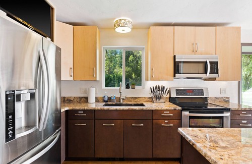 West Glacier Casa | Fly-Fishing Haven, 5 Min to Glacier Park, Scenic Home with Hot Tub & Firepit
