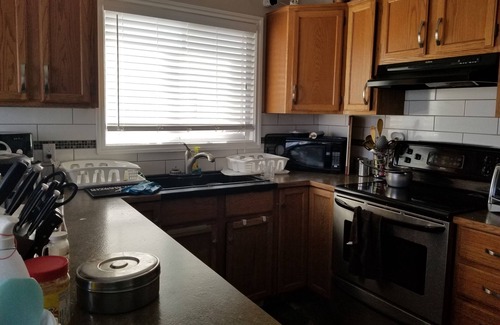 Northwest Calgary Casa | For female only Bedroom with queen bed