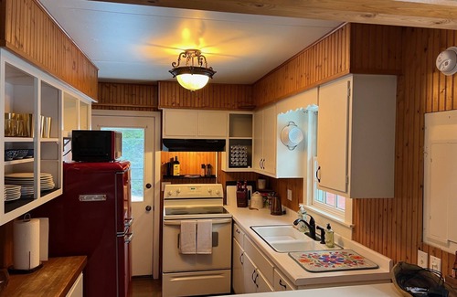 Sturgeon Bay Casa | Forest A-frame with fireplace