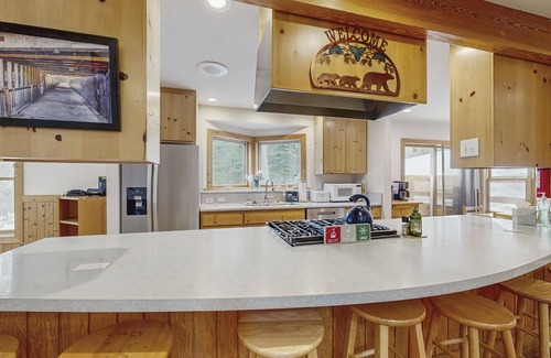 Serene Lakes Casa | Forest-view home with deck, grill, 2 living areas, fireplace, washer/dryer