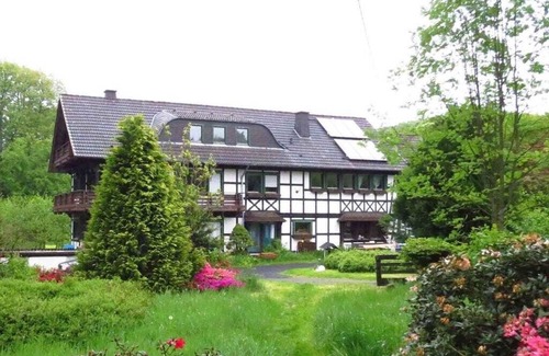 Schladern Casa | Former. Mill vacation home. Secluded location, close to nature, lots of space. Ideal for groups.