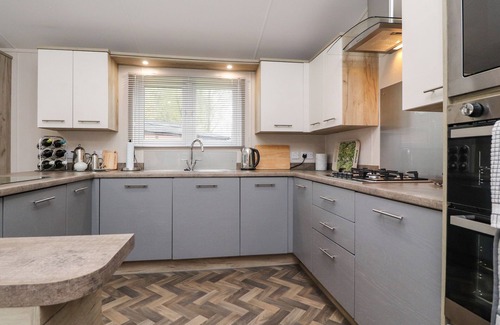 Yealand Conyers Cabaña | FOUNTAIN VIEW, with a garden in Carnforth
