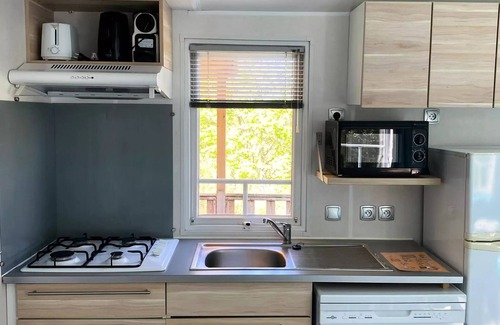 Rouffignac-Saint-Cernin-de-Reilhac Casa | Flower Camping Les Terrasses de Dordogne *** - Mobile home Premium 30 m2 (3 bedrooms) terrace semi-covered 15m2 + TV + LV + Clim 6 persons