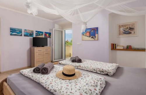 Gabonjin Casa | Casa de vacaciones Franjo (MLK372) en Krk/Malinska - 4 personas, 2 dormitorios