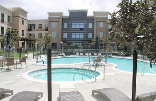 Bressi Ranch Condominio | Free Breakfast Included! Pool & Hot Tub Access. Great Location!