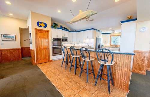 Buck Island Casa | Free pool heat, hot tub, elevator, chefs kitchen, gated community with tennis, lap pools, ocean f...