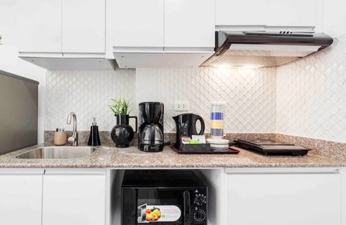 Mactan Export Processing Zone Apartamento | Fresia by J&J (Near Airport| Wi-Fi |Netflix)