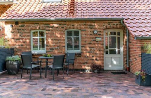 Utarp Apartamento | Friesenwind - Hochwertige Ferienwohnung mit Gartenoase