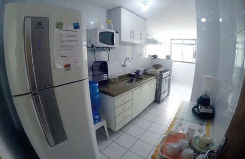 Muquicaba Apartamento | Edificio frontal w / una playa en Guarapari: Todo amueblado / Inter. wifi + TV por cable