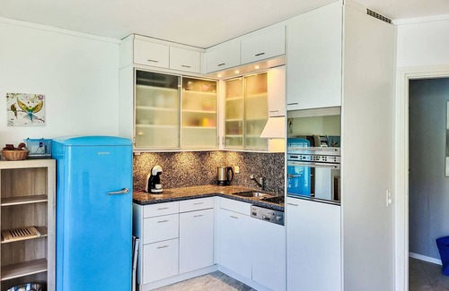 Bissone Apartamento | Frontlake Panorama Apt. 408 by Interhome