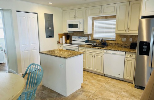 Naples Casa | Full 3-bedroom Canal Front home, in Goodland Fl