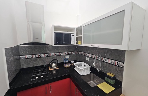 Los Cedros Apartamento | Fully equipped studio with kitchen; ideal for long stays.