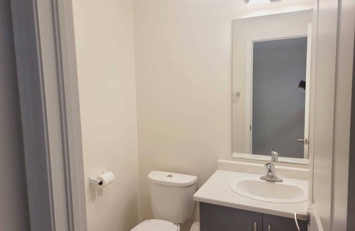 Kitchener Casa | Fully furnished Studio basement with bed, kitchen, laundry, living room with TV