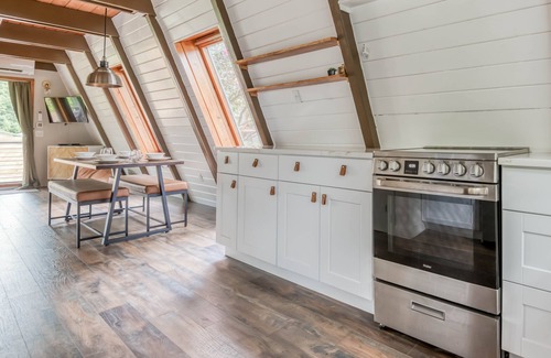 South Beach Casa | Fully Remodeled, Modern A-Frame Gem with Hot Tub, Deck, and Fire Pit!