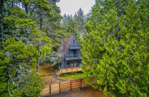 South Beach Casa | Fully Remodeled, Modern A-Frame Gem with Hot Tub, Deck, and Fire Pit!