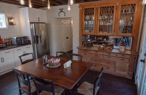 Cleveland Park Casa | Fully renovated 1800s Carriage House seamlessly blends history w/modern luxury.