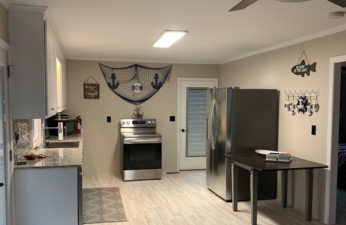 Fair Play Cabaña | Fun Lake Home on a Peninsula with Personal Dock-30 min from Clemson!