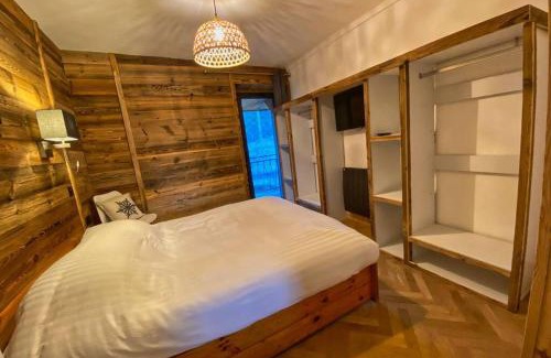 Les Sagnieres Apartamento | Gîte avec jacuzzi privatif