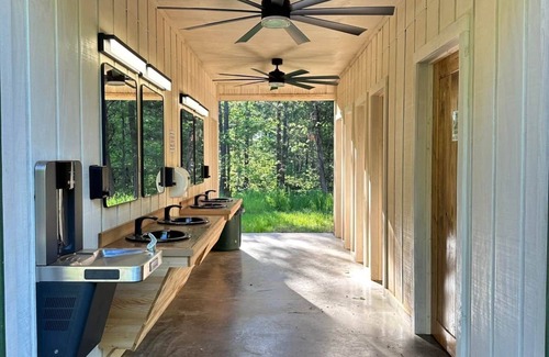 Talladega Cabina | G-2 Glamp in Bohamia - 268 Acre Forest Retreat