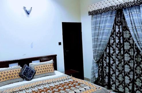 Gulshan-E-Jamal Cama Y Desayuno | Galaxy Inn - Near Jinnah International Airport Branch