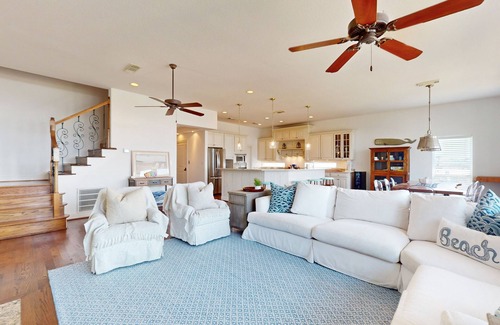 Indian Beach Casa | Galveston home with open floor, balcony, patio and water views