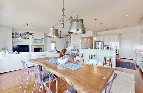 Indian Beach Casa | Galveston home with open floor, balcony, patio and water views