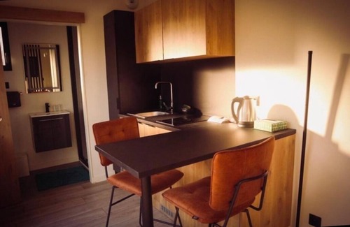 Meyzieu Apartamento | Garden studio with pool view