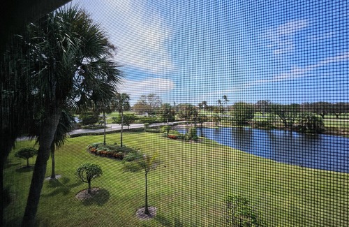 Imperial Golf Estates Condominio | Gated, 2-bedroom condo in brilliant Naples overlooking the 9th tee