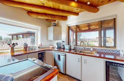 Taos Casa | Gated mountain-view gem with tennis, labyrinth, rooftop bar, private hot tub