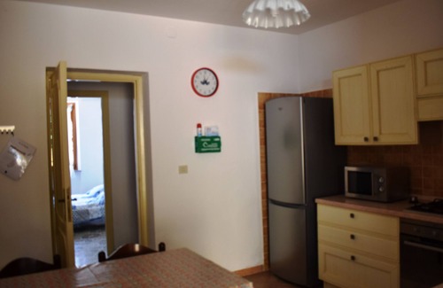 Iscra e Voes Condominio | Gemütliche Ferienwohnung mit Blick auf die Strandbucht La Caletta