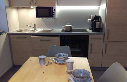 Nordheim a. Main Apartamento | Acogedor apartamento de 50 m2 con balcón, estacionamiento gratuito y wifi, desayuno buffet, cocina totalmente equipada.