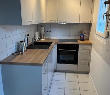 Loerrach Apartamento | Gemütliche Ferienwohnung im alten Ortskern von Tüllingen