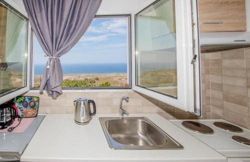 Therasia Cama Y Desayuno | George Sunset Rooms