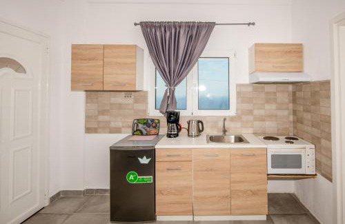 Therasia Cama Y Desayuno | George Sunset Rooms