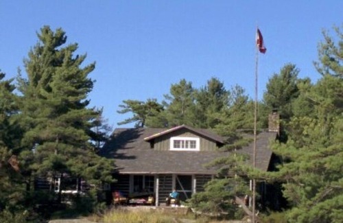 The Archipelago Cabaña | Georgian Bay Private island, unique authentic log cabin