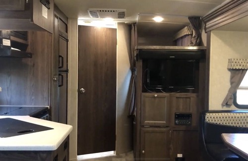 Lafayette Casa | Glamp in a cozy RV waking up to Nature Trails out your front door.