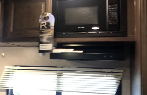 Lafayette Casa | Glamp in a cozy RV waking up to Nature Trails out your front door.