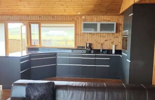 Arnarstapi Casa | Glass House with Private River & 360° Views