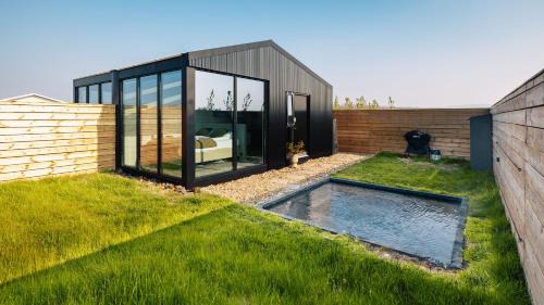 Reykholt Casa | Glass roof lodge with private hot tub