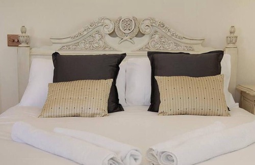 Rhossili Casa | Con vistas al mar, Glebe Farm es una fabulosa casa de vacaciones que rezuma estilo con toques lujosos. Desde