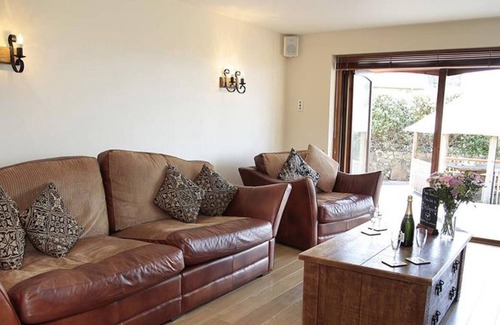 Rhossili Casa | Con vistas al mar, Glebe Farm es una fabulosa casa de vacaciones que rezuma estilo con toques lujosos. Desde