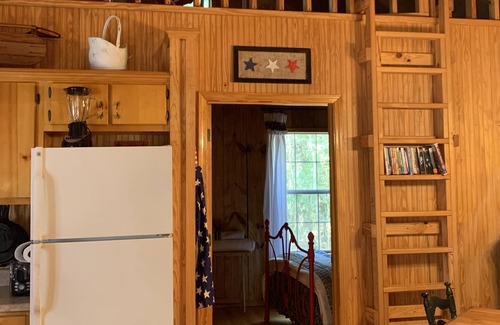 Lucedale Cabina | Go off the beaten path and find "Peace on the River" with family & friends.”