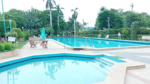 South West Hotel | Goa Country Club Near Park Hospital BY Pearl I Luxury resort in Gurgaon