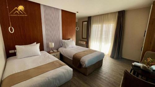 Giza Hotel | Golden palm sunrise inn