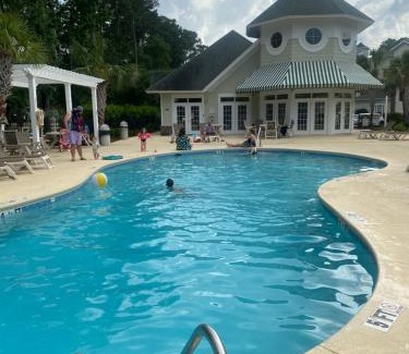 Carolina Forest Apartamento | Golfers Paradise First Floor unit Patio Pool Restaurant Bar on premises Few Miles to Everything else! Spacious Condo Stocked with all You Need!