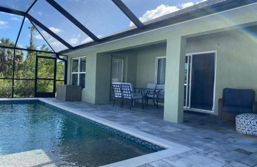 North Port Casa | Gone Coastal! Large Heated pool home 30 min from beaches!